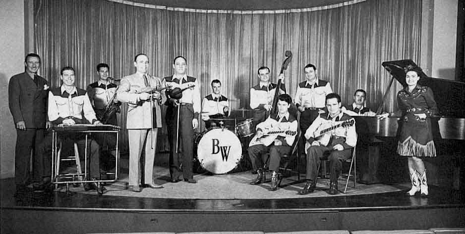 Bob Wills and His Texas Playboys Los Angeles 1944  left to right- Everett Stover, Les Anderson, Tiny Mott, Bob Wills, Louis Tierney, Monte Mountjoy, Rip Ramsey, Jimmy Wyble, Tommy Duncan, Cameron Hill, Millard Kelso, Laura Lee Owens