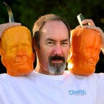 Tony Dighera holds a couple of his Frankenstein pumpkins he grows at his farm, Cinagro Farms in Fillmore. Friday, Sept. 26, 2014. His Frankenstein pumpkins are for sale at Whole Foods and Gelsons. (AP Photo:Los Angeles Daily News, Michael Owen Baker)
