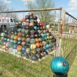 chris-barbees-bowling-ball-yard-art-pyramid