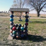 chris-barbees-bowling-ball-yard-art-wishing-well