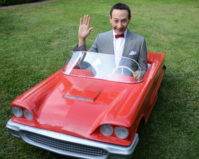 Pee-wee Herman in a miniature red car!!!!