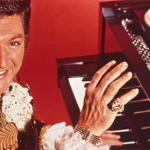 Liberace at the piano